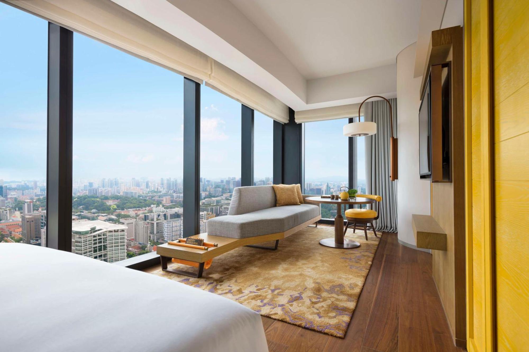 Deluxe Corner King Room Shower City View